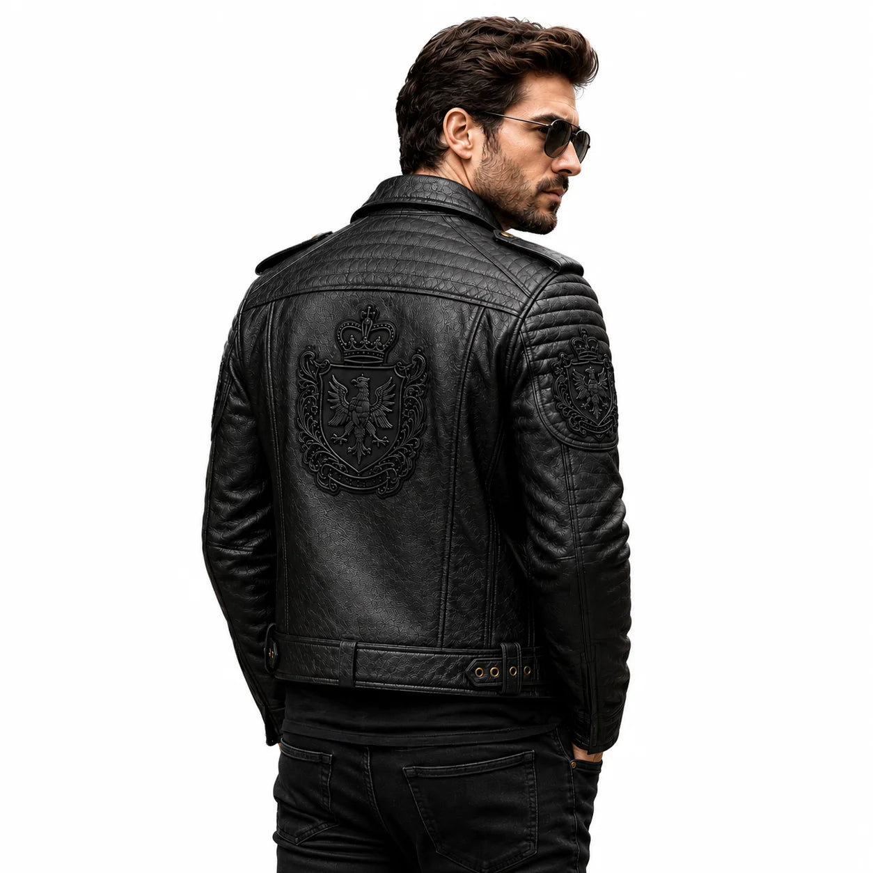 Man wearing black leather crested biker jacket, lifestyle shot back wearing look