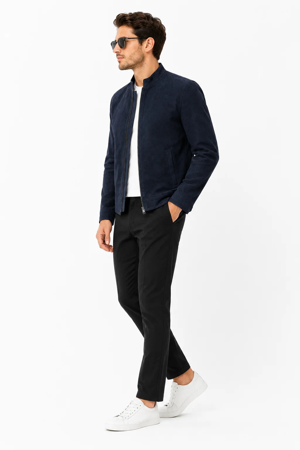 Man wearing suede cafe racer jacket with black jeans and boots, street style