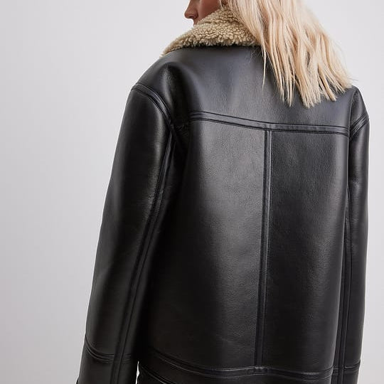 Black leather aviator jacket for women, oversized dropped-shoulder cut, back view