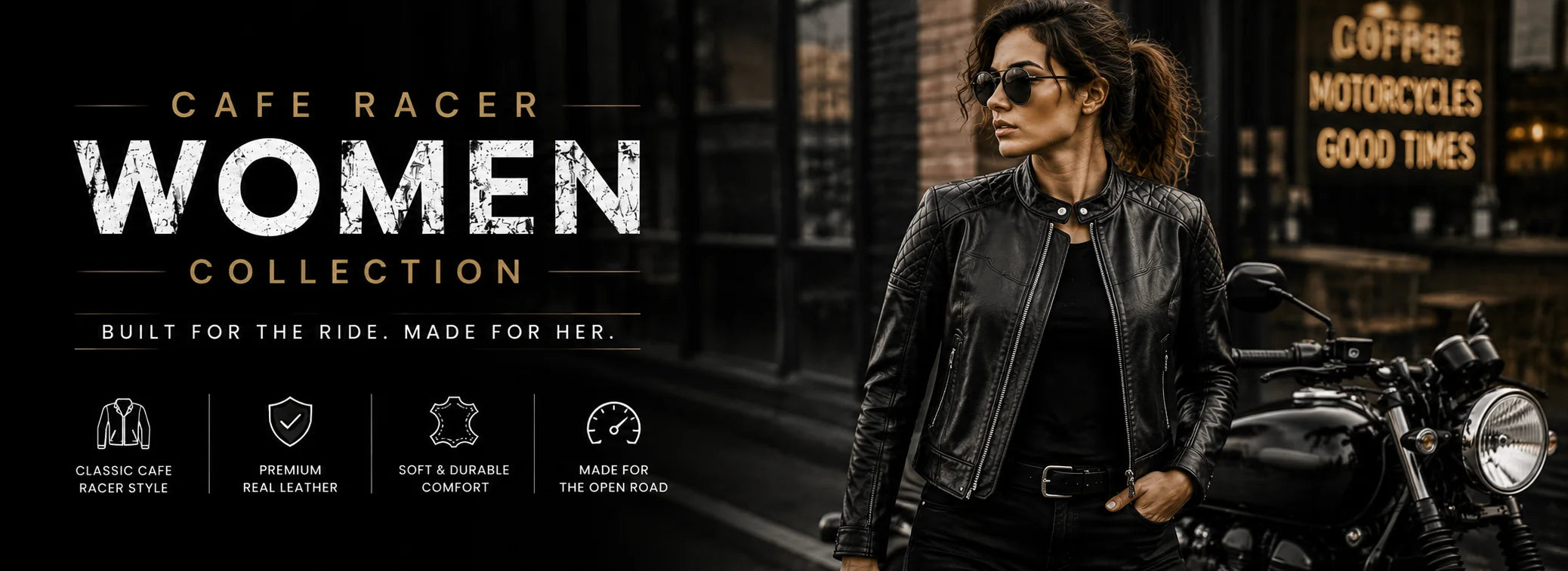 A woman wearing a black leather motorcycle jacket and sunglasses stands beside a motorcycle in a dark urban street setting. 