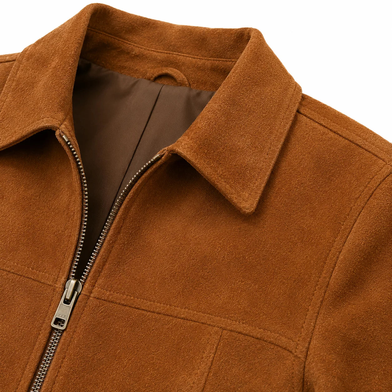 Close-up of caramel suede nap texture and structured shoulder seam, women's jacket