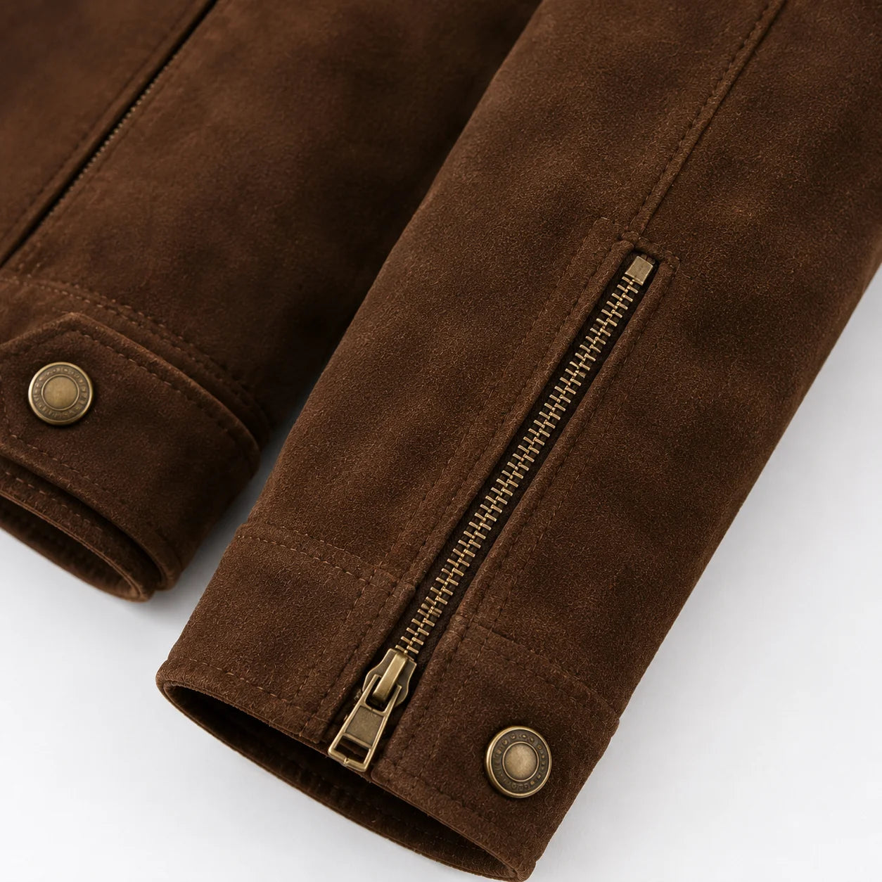 Close-up of suede biker jacket brass YKK zipper
