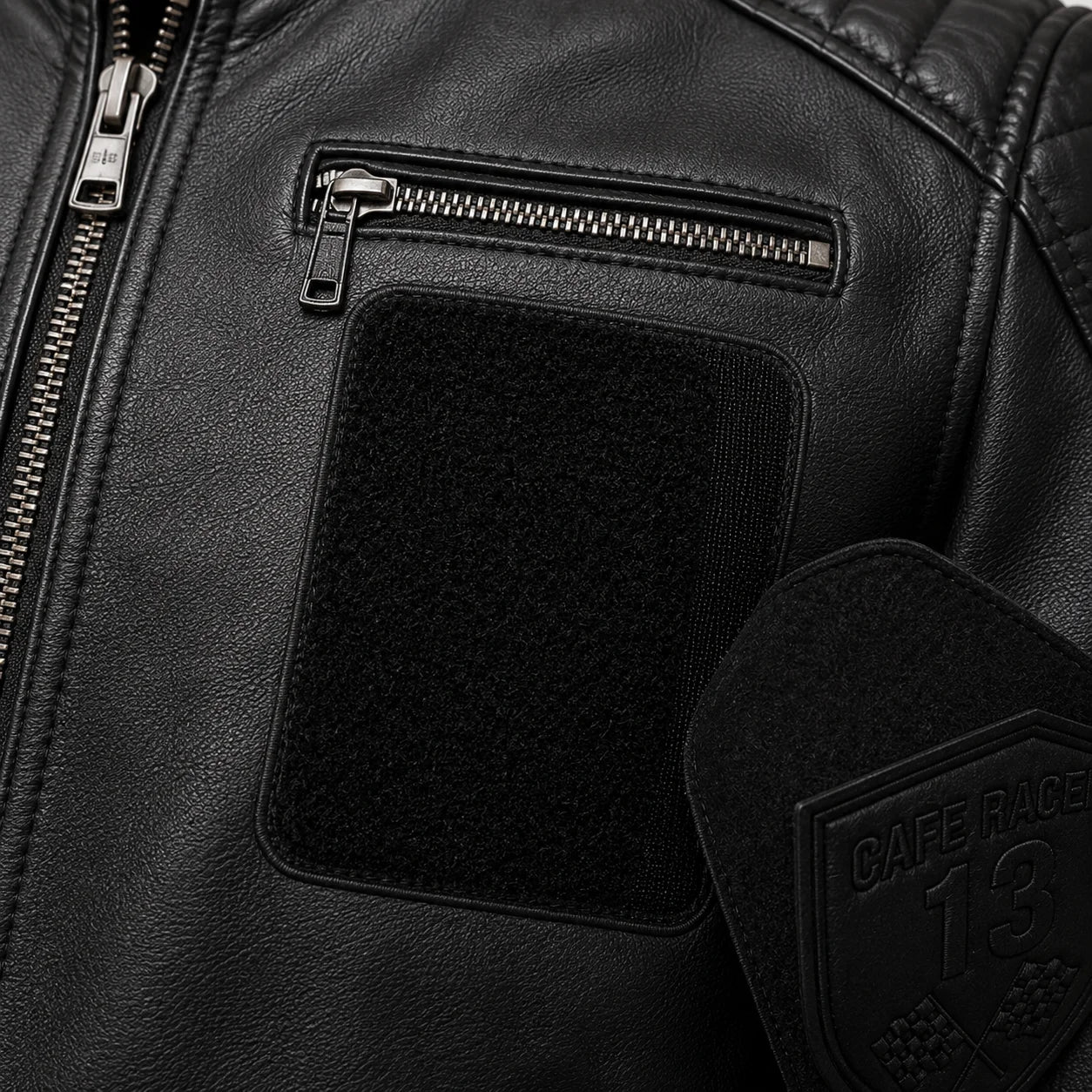 Close-up of hook-and-loop patch panel on cowhide leather jacket