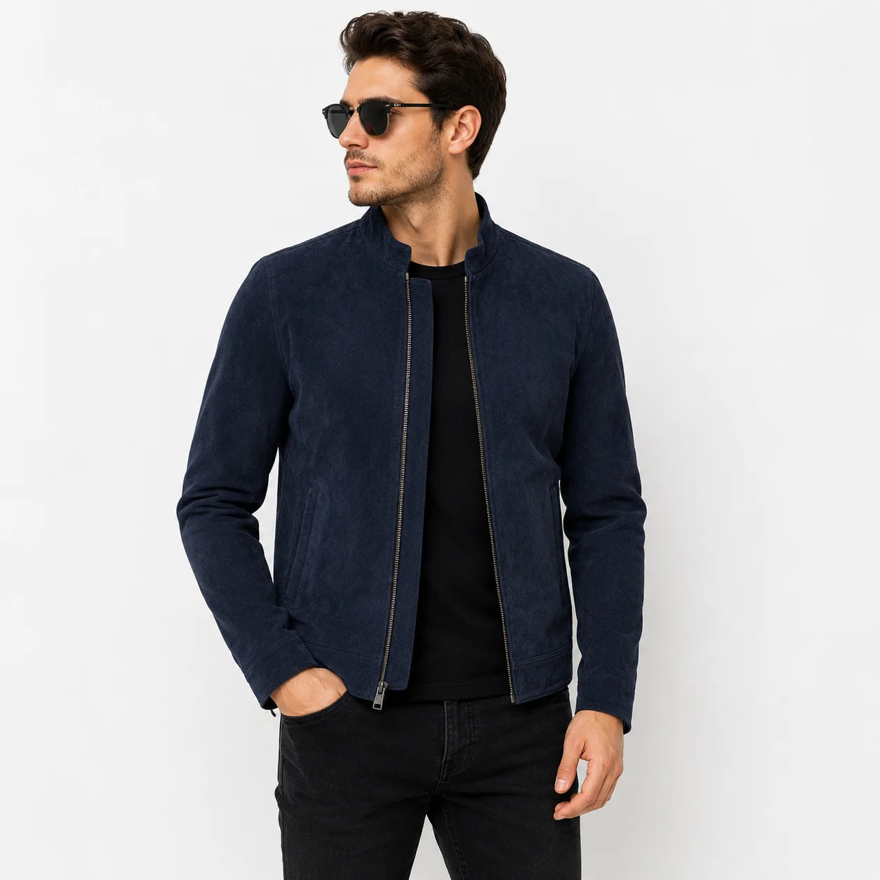 Man wearing suede cafe racer jacket with black jeans and boots, street style