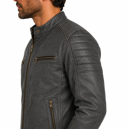 Man wearing grey leather crested motorcycle jacket, lifestyle shot, side closeup