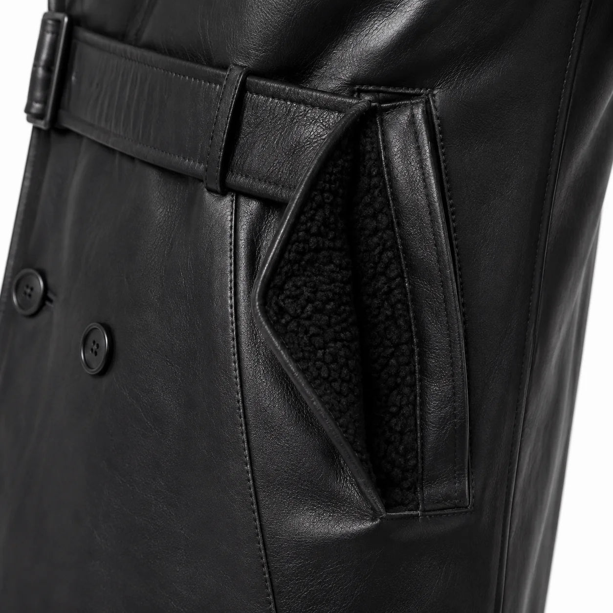 Men’s shearling lined trench coat exterior pocket natural wool lining close up