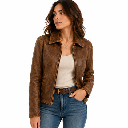 Woman wearing natural patina vintage leather jacket, casual styling with jeans