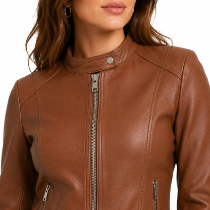 Close-up of stand-up collar and buckle strap detail on women's café racer leather jacket