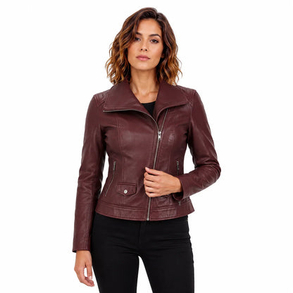 Woman wearing a wine red lambskin leather moto jacket styled with black jeans, front view